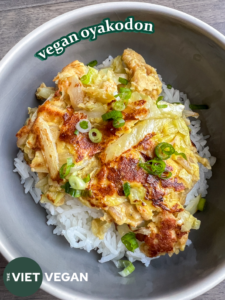 The finished oyakodon dish is served over rice, with sauce, in a bowl